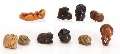 A collection of Japanese wood netsuke, 20th century,