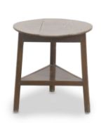 A George III oak two tier cricket table,