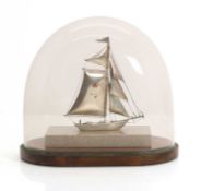 A silver Yokohama shipyard model,