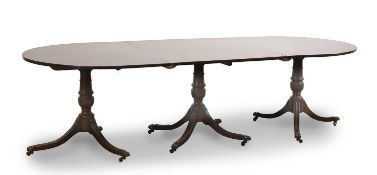 A mahogany triple pillar dining table, 19th century,