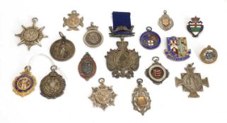 A collection of silver and enamelled medallions and badges, various dates,