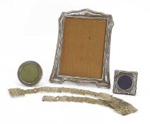 A silver photograph frame, by Green & Cadbury Ltd., Birmingham, 1919,
