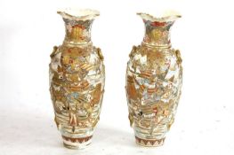 A pair of large Japanese satsuma pottery vases, 19th century,