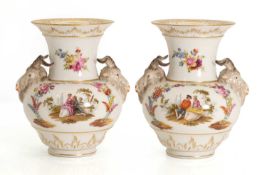 A pair of KPM porcelain ram's head vases 19th century,