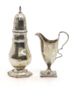 A George III silver helmet shaped cream jug,