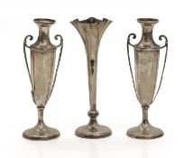 A pair of silver urn shaped spill vases, Birmingham, 1908,