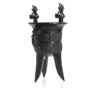 A Chinese archaistic bronze jue tripod wine vessel, 20th century,