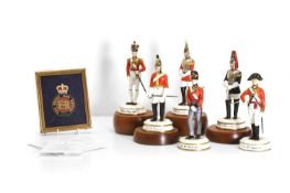 A collection of Michael J Sutty English Bone China Figures