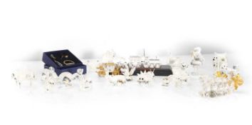 A collection of 24 Swarovski crystal items,