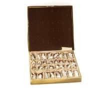 A German porcelain chess set in the form of mice,