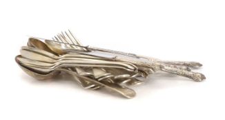 A collection of silver flatware,