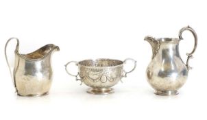 Two silver cream jugs, and a twin-handled bowl,