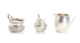 Three silver cream jugs, various dates,