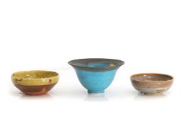 A group of three studio pottery bowls,