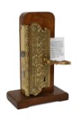 A Brass Upright RH Rim Sash Lock, no key, with finely ornamented cast brass case, nozle protruding