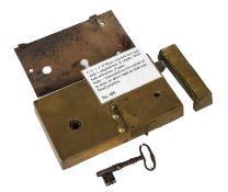 A 19th Century Brass Warded Rim Lock, with one original key and staple, slide bolt at bottom of case