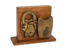 An All Brass Union Padlock and Key, with four detainers and Butter's System, discontinued around