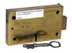 A 19th Century Brass Square Edged Brass Rim Deadlock, four lever, with large key 20cm by 12.5cm