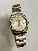 STAINLESS STEEL ROLEX OYSTER PERPETUAL DATE WATCH 