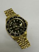 18c YELLOW GOLD ROLEX GMT MASTER WATCH