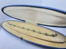 APPROX. 6.00ct EMERALD BRACELET SET IN WHITE METAL APPROX. ADJUSTABLE FROM 7'' TO 8'' LENGTH