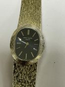 18ct GOLD PATEK PHILIPPE ELLIPSE WATCH WITH BLACK DIAL & TEXTURED GOLD BRACELET