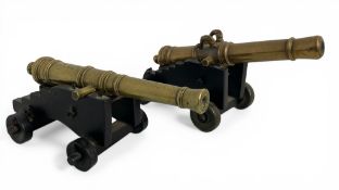 A matched pair of 19th century brass table cannons
