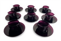 A set of eight early Victorian amethyst glass rinsers or coolers with stands, circa 1830-1850