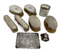 A group of Victorian and Edwardian silver dressing table accessories