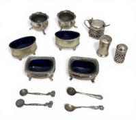 A group of silver and silver plated condiment pots