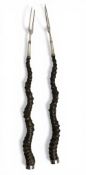 A large pair of 19th century antler and white metal toasting forks