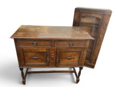 A 1920's oak side cabinet and a 1930's oak glazed bookcase,