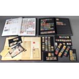 Three stamp albums containing Victorian and later stamps, to include examples from Israel, Qatar, UK
