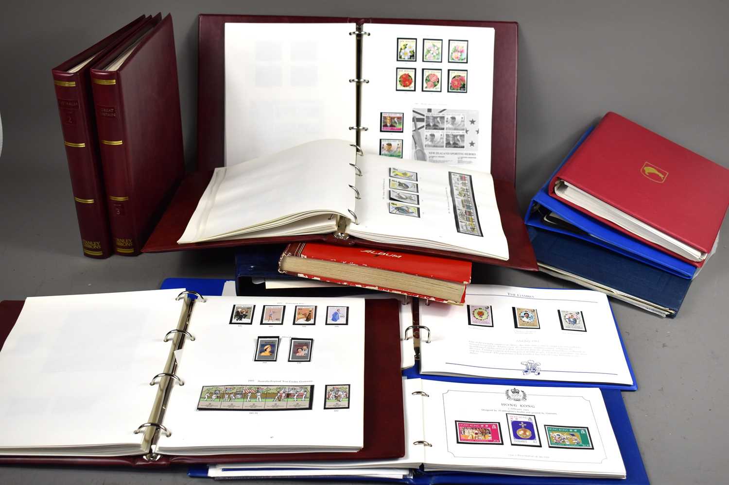 A collection of albums containing GB and Worldwide stamps , to include The Royal Wedding 1981 album,