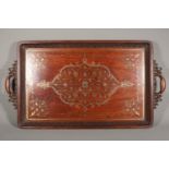 Indian carved rosewood and brass inlaid twin handled serving tray, 72cm x 40cm.