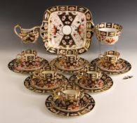 A Royal Crown Derby 2451 pattern Imari part tea service, early 20th century, comprising: six ring