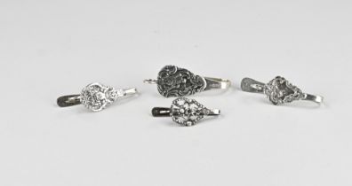 4 Silver skirt hooks