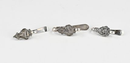 3 Silver skirt hooks, 18th century