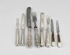 Various silver travel cutlery