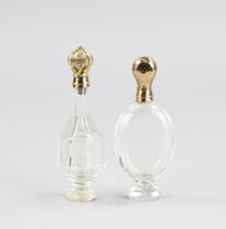 2 perfume bottles with gold