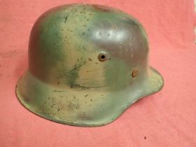 WW2 German M42 steel helmet in camouflage M42 helmet with a late war, Normandy-type three-colour