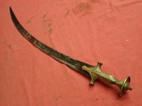 Antique Talwar sword with brass hilt. Plain curved blade 725 mm long. All brass decorated hilt