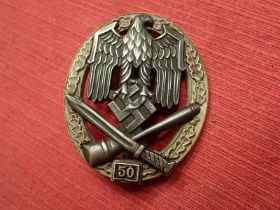 German Army 50 action General Assault Badge The rare General Assault badge with 50 plate. Three