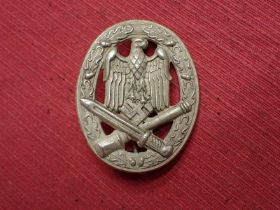 WW2 German Army General Assault Badge Die-stamped badge with high pin set. Good crisp condition.