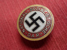 3rd Reich German NSDAP members badge Four colour enamel badge. On buttonhole-type fixing. All the