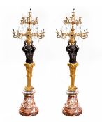 Large pair of bronze candlesticks, 276 cm high