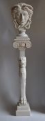Marble sculpture of Medusa on a trapezoidal frame