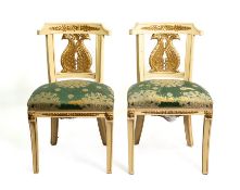 Pair of lacquer and gold chairs