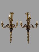 Pair of bronze wall lights