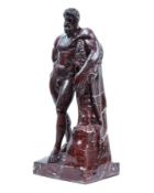 Sculpture of Hercules in red Levanto